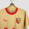 Maillot extérieur or du RC Lens saison 2023-2024 (édition Puma) photographié de profil, idéal pour les supporters souhaitant l’acheter.