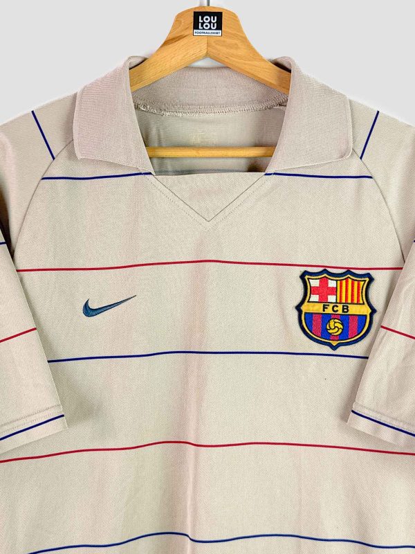 Vue de face du maillot rétro Barça 2003-2004, époque Ronaldinho au Camp Nou