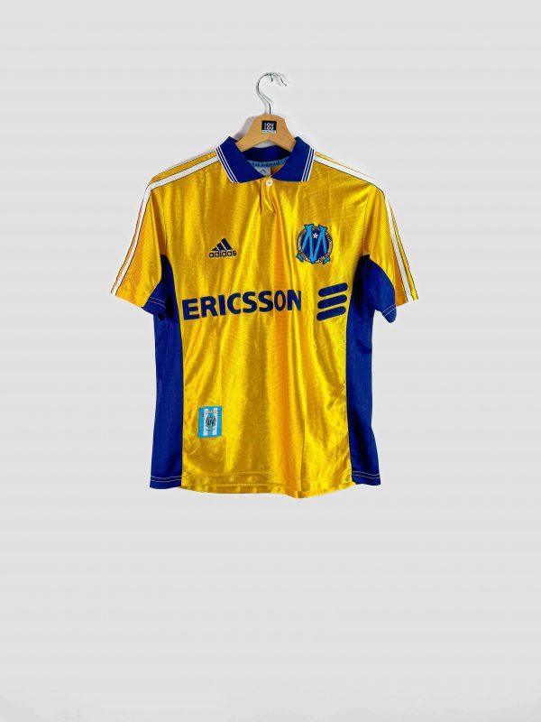 Maillot domicile Olympique de Marseille 1998-1999 Adidas, coloris jaune et bleu avec sponsor Ericsson.