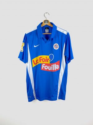 Maillot du Montpellier HSC saison 2010-2011 bleu ciel floqué du sponsor “La Foir’Fouille”