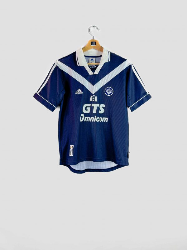Maillot rétro des Girondins de Bordeaux 99-00, symbole de la génération championne de France 1999.