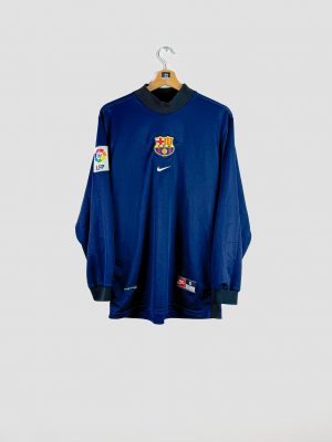 Vue de face du maillot de gardien FC Barcelone 1998 par Nike : bleu marine, col noir, avec l’écusson FCB et la virgule Nike brodés.