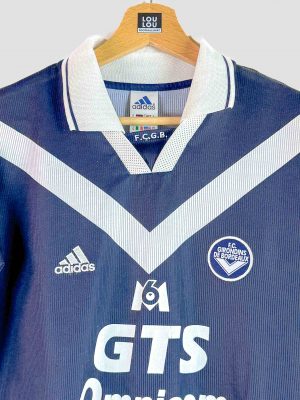Maillot vintage du FC Girondins de Bordeaux 99-00 floqué Wiltord numéro 11, design bleu marine iconique.