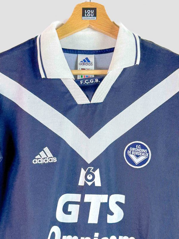 Maillot vintage du FC Girondins de Bordeaux 99-00 floqué Wiltord numéro 11, design bleu marine iconique.
